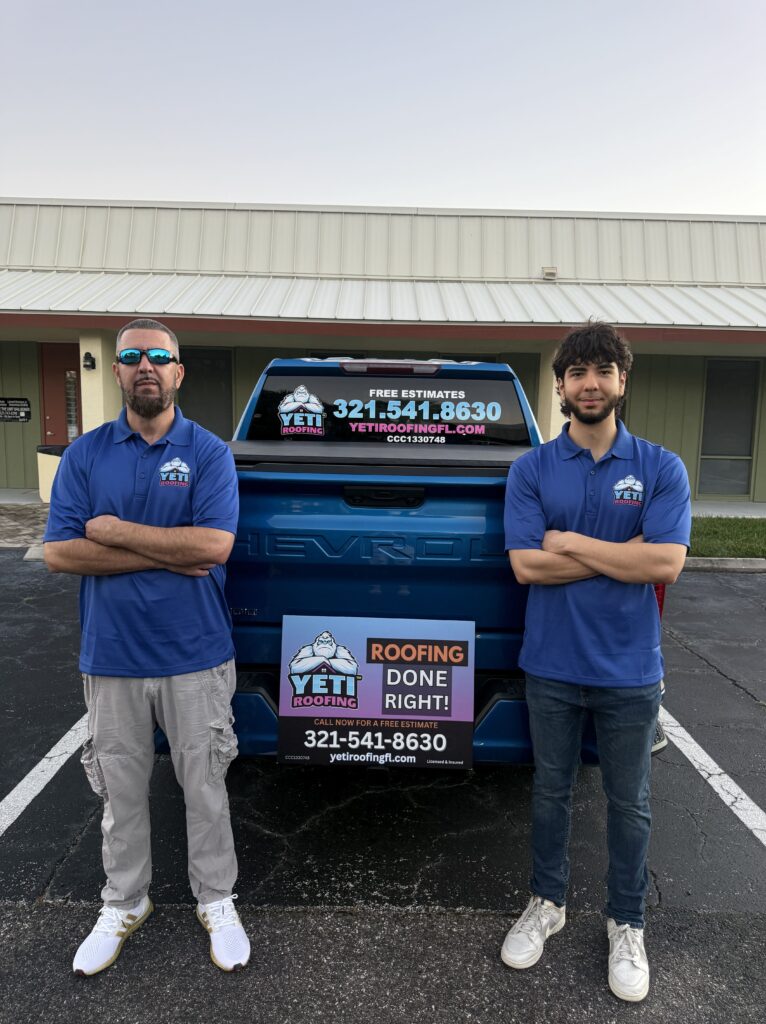 The Yeti roofing Owners Justin and Cosmin standing in front of their truck